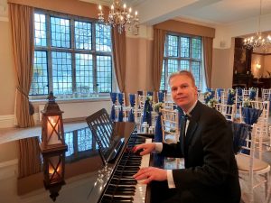 Candle on Grand Piano